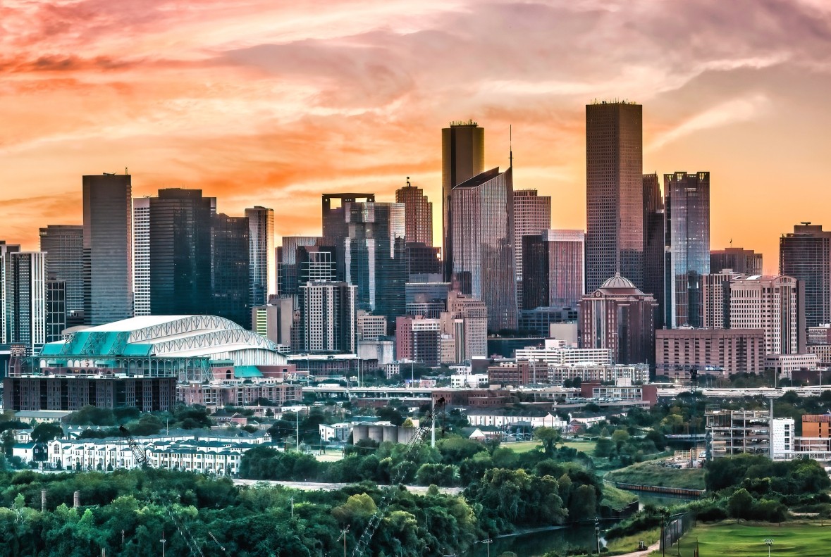 Houston skyline at sunset with skyscrapers and stadium