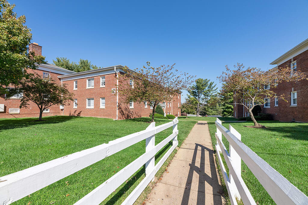 Patrick Henry Apartments brick buildings with walkway