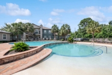 Fallbrook Ranch Apartments pool with palm trees