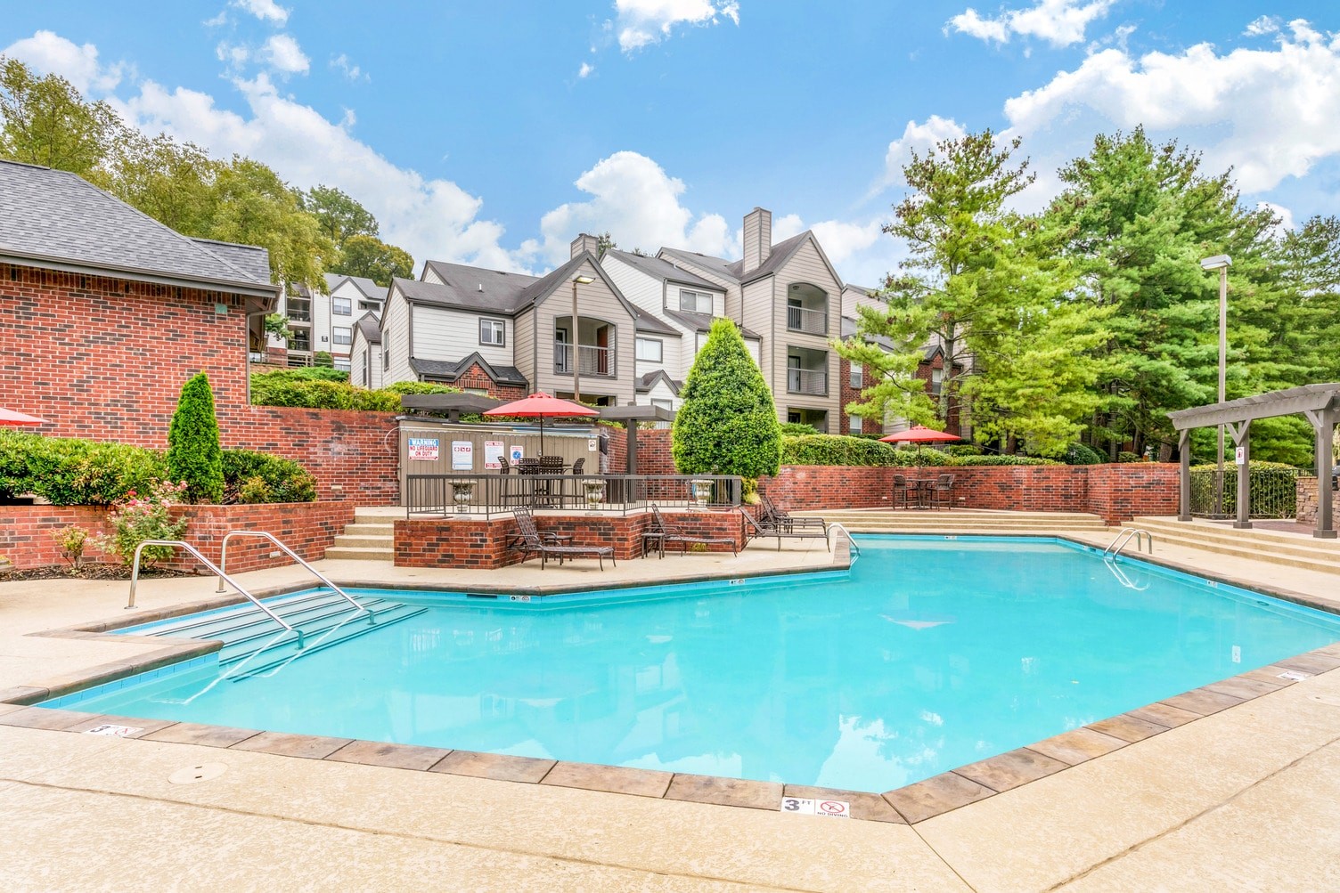 Apartment pool with garden-style buildings
